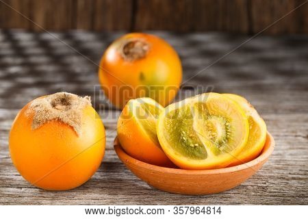 Fruit Of Lulo Or Naranjilla On Wood