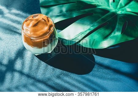 Flay Lay Favorite And Trend Of Summer Drink From Dalgona Or Frothy Coffee On White And Shadow Of Pal
