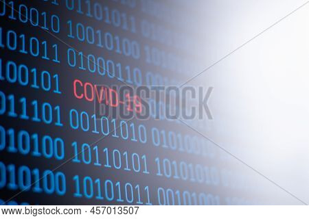 Binary Computer Code With Red Inscription Covid-19. Concept Of Indentifying Coronavirus By Using Mod