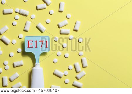 Titanium Dioxide, E171, Dangerous Additive Concept. Gum, Pills, Toothpaste Or Cream And Sign With E1
