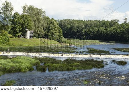The Widest Waterfall And Beach In Europe In Latvia Kuldiga. River Venta And Flying Fishes. High Qual