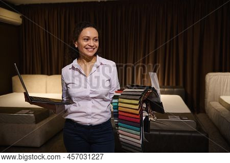 Creative Woman, Home Interior Designer Working On New Home Design Project, Holding Laptop In Her Han
