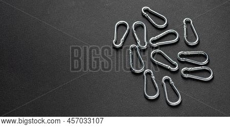 4mm Climbing Carabiner Isolated Against A Dark Background