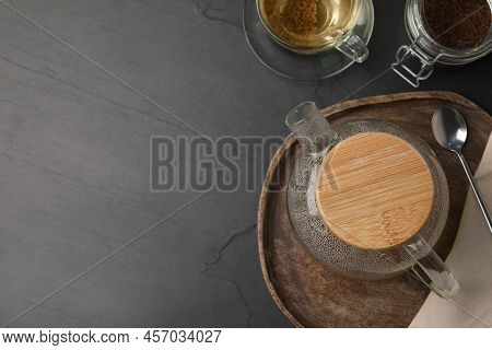 Freshly Made Buckwheat Tea Served On Grey Table, Flat Lay. Space For Text