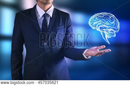 Business Idea Brain In Man Hand On Hand