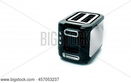Black Toaster Isolated On White Background. Brushed Stainless Steel Toaster For Bread Toast. Two Slo