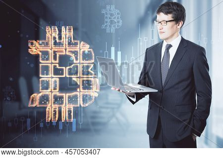 Digital Money, Cryptocurrency Trading And Investing Concept With Handsome Man In Suit Using Laptop O