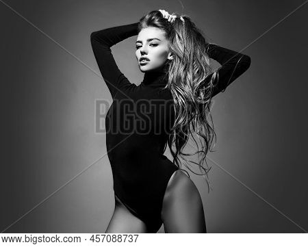 Sexy Woman. Sensual Girl With Perfect Long Hair. Beautiful And Young Woman.