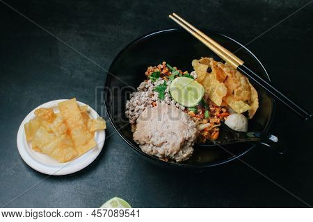 Spicy Tomyum Thai Noodle Soup With Lemon, Chilis,coriander, Lemon Grass. Thai Noodle Street Food.