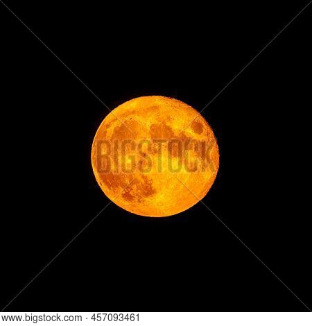 Bright Orange And Red Fool Moon Over The Sea. Red Full Moon In Red Color Also Called Bloodmoon