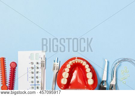 A Set Of Special Tools For An Orthodontist To Install Braces For A Patient. Orthodontic Arcs, Ligatu