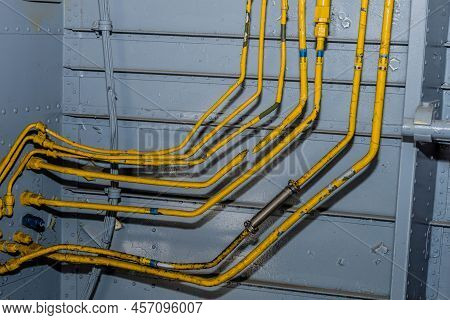 Exposed Metal Hydraulic Lines In Airplane