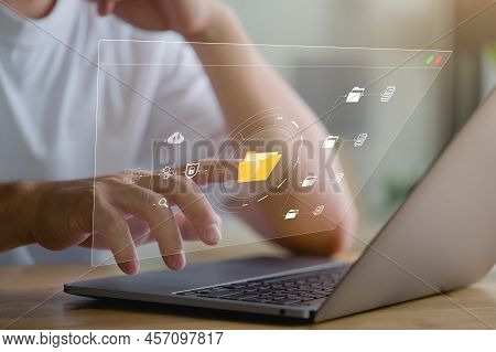 Document Management System Concept, Business Man Holding Folder And Document Icon Software, Searchin
