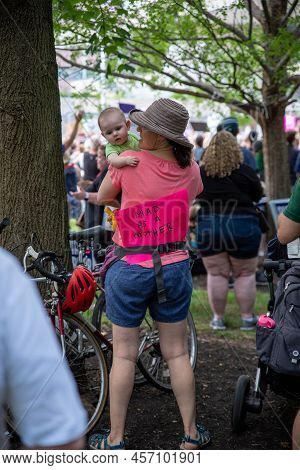 Philadelphia, Pa Usa - 06-25-2022 Mad As A Mother Woman With Baby Wears A Feminist Pro-choice Sign A