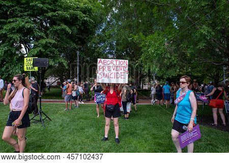 Philadelphia, Pa Usa - 06-25-2002 Woman At A Political Pro-choice Rally Holds A Feminist Sign That R