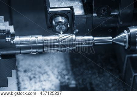 The Multi-tasking Cnc Lathe Machine Swiss Type Milling Cut The Metal Parts By Milling Spindle. The H