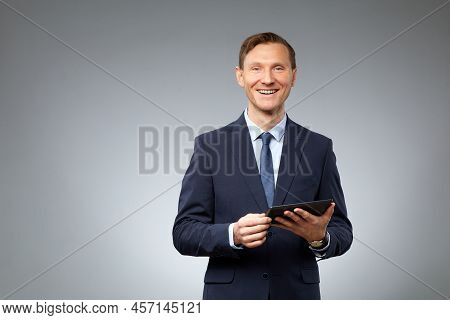 Photo Realistic Digital Collage Of Smiling Businessman With  Artificial Face Of Asian Ethni