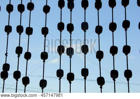 Curtains Made Of Little Wood Marbles In The Front Door Of A Summer House In Punta Del Diablo, Rocha,