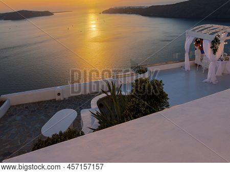 Imerovigli, Santorini, Greece - June 29, 2021: Terrace In The Village Of Imerovigli With Amazing Vie