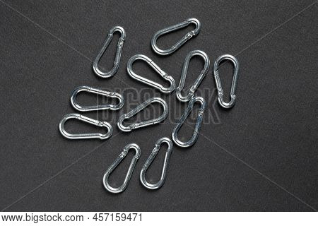 4mm Climbing Carabiner Isolated Against A Dark Background