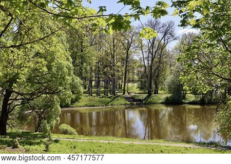Lake In Town Park In Aluksne, Latvia, On A Bright Spring Day
