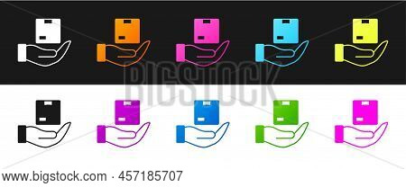 Set Delivery Insurance Icon Isolated On Black And White Background. Insured Cardboard Boxes Beyond T