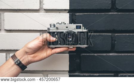 Close-up, Vintage Film Retro Camera In Male Hands.