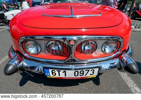 Ostrava, Czechia - 06.05.2022: Low Angle Wide Vertical Frontal Shot Of Red Tatra 603 Veteran Car. Pe