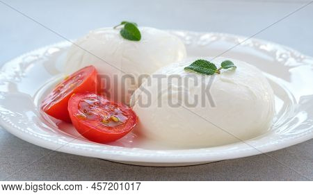 Traditional Buffolo Milk Mozzarella Cheese On The Plate