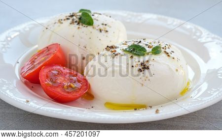 Traditional Buffolo Milk Mozzarella Cheese On The Plate