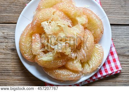 Pomelo Fruit On Wooden Plate, Fresh Pomelo Peeled Frome Pomelo Tree , Pummelo , Grapefruit In Summer