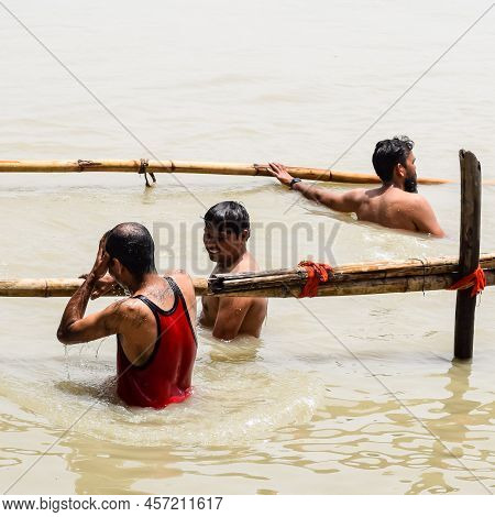 Garh Mukteshwar, Uttar Pradesh, India - June 11 2022 - People Are Taking Holy Dip On The Occasion Of