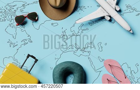 Travel Props And Equipment With Blue Paper Worldwide Map And Wanderlust Equipment Background. Fashio