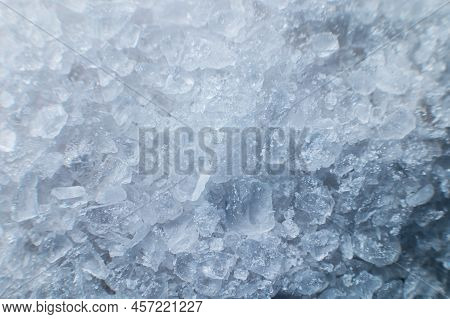Close-up Of Crystals Of Dark Sea Iodized Salt. Extreme Macro Background Minerals Salt