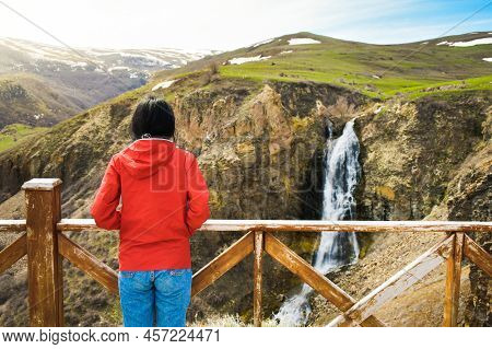 Young Caucasian Woman Stand On Viewpoint Enjoy Susuz Waterfall Panorama Outdoors On Holiday