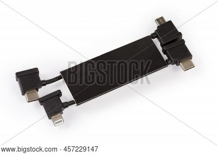 Two Short Cables With Plugs Usb Type-c On The One Edges And Micro Usb And Lightning Respectively At 