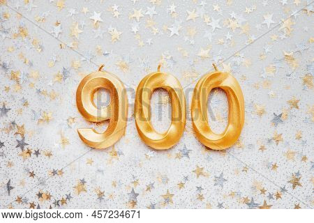 900 Nine Hundred Followers Card Golden Birthday Candle On Festive Background. Template For Social Ne