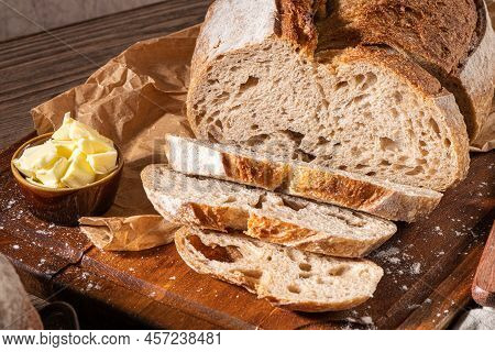 Freshly Artisan Baked Wheat And Rye Bread, Country Bread. Simple Bread  With Butter For Breackfast
