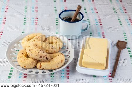 Chipas, Typical South American Cheese Bun On A Plate With Butter And Coffee.