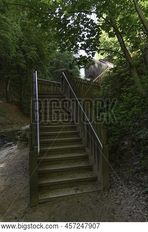 Wooden Stairs Made In The Walking Path At The Schiessentumpel In Luxembourg In The Mullerthal