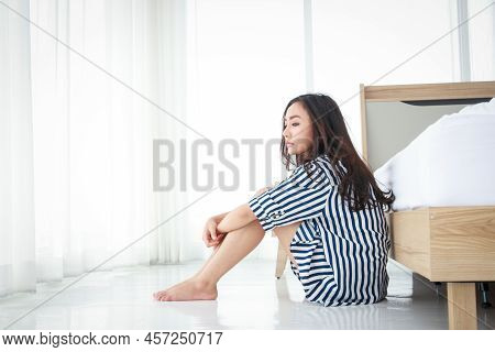 Asian Woman In Bedroom She Felt Stressed, Sad, Unable To Sleep. Health Care Concept. Not Enough Rest