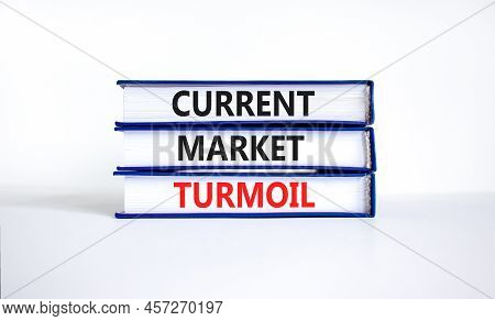 Current Market Turmoil Symbol. Concept Words Current Market Turmoil On Books On A Beautiful White Ta