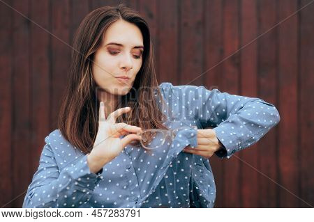 Woman Cleaning Her Eyeglasses Using Her Own Shirt - Impulsive Girl Using Her Clothing To Clean Her G