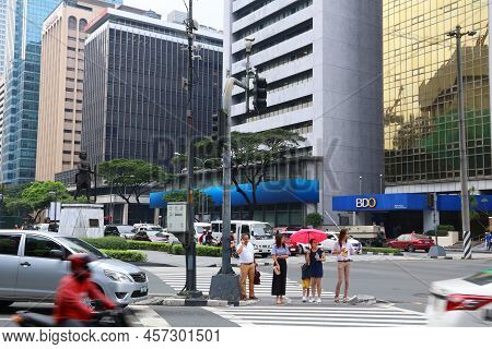 Manila, Philippines - December 7, 2017: People Visit Paseo De Roxas In Makati City, Metro Manila, Ph