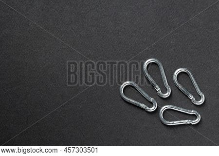 4mm Climbing Carabiner Isolated Against A Dark Background