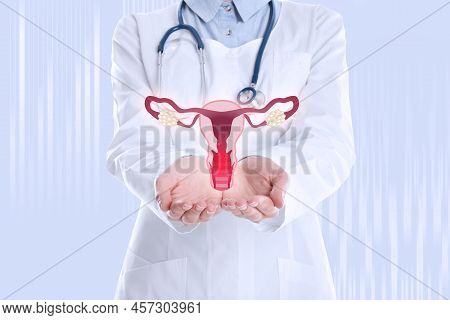 Doctor Demonstrating Virtual Image Of Inflamed Female Reproductive System On Light Background, Close