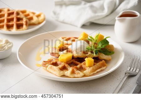 Popular Croffles With Maple Syrup And Whipped Cream For Delicious Breakfast. Croissant As Waffle.