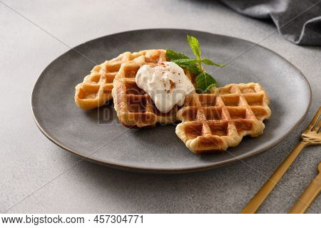 Breakfast With Croffles On Gray Background. Croissant As Waffle.