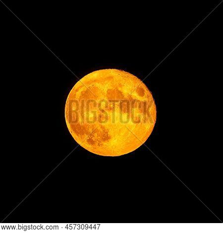 Bright Orange And Red Fool Moon Over The Sea. Red Full Moon In Red Color Also Called Bloodmoon
