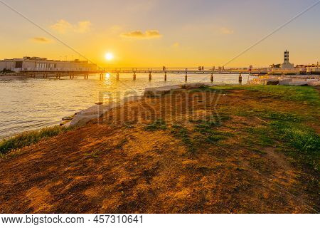 Sunset View Of The Yarkon River Estuary To The Mediterranean Sea, The Wokop Bridge, Reading Lighthou